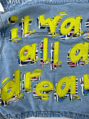 women's graffiti machine embroidered upcycled denim jacket: it was all a dream, cropped