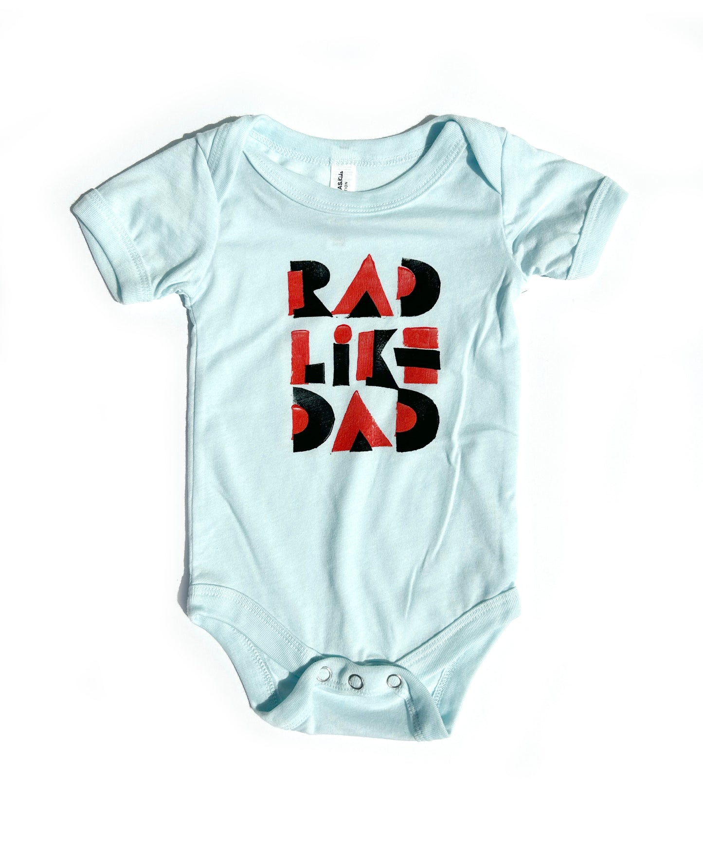 rad like dad  baby one piece: bi-color block print