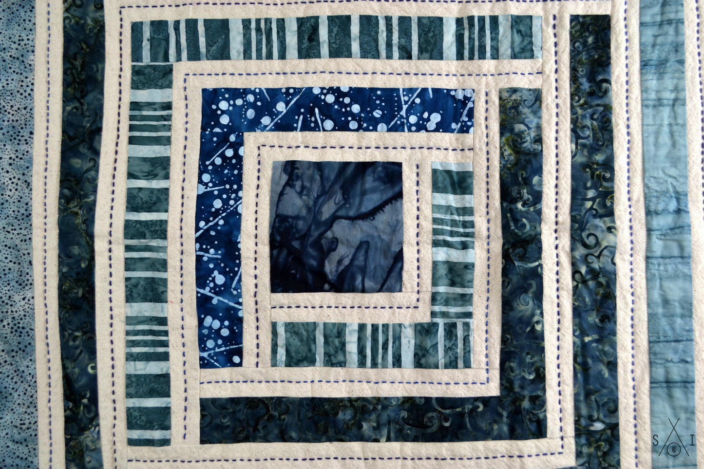 campfire baby quilt: blue batiks and osnaburg fabric