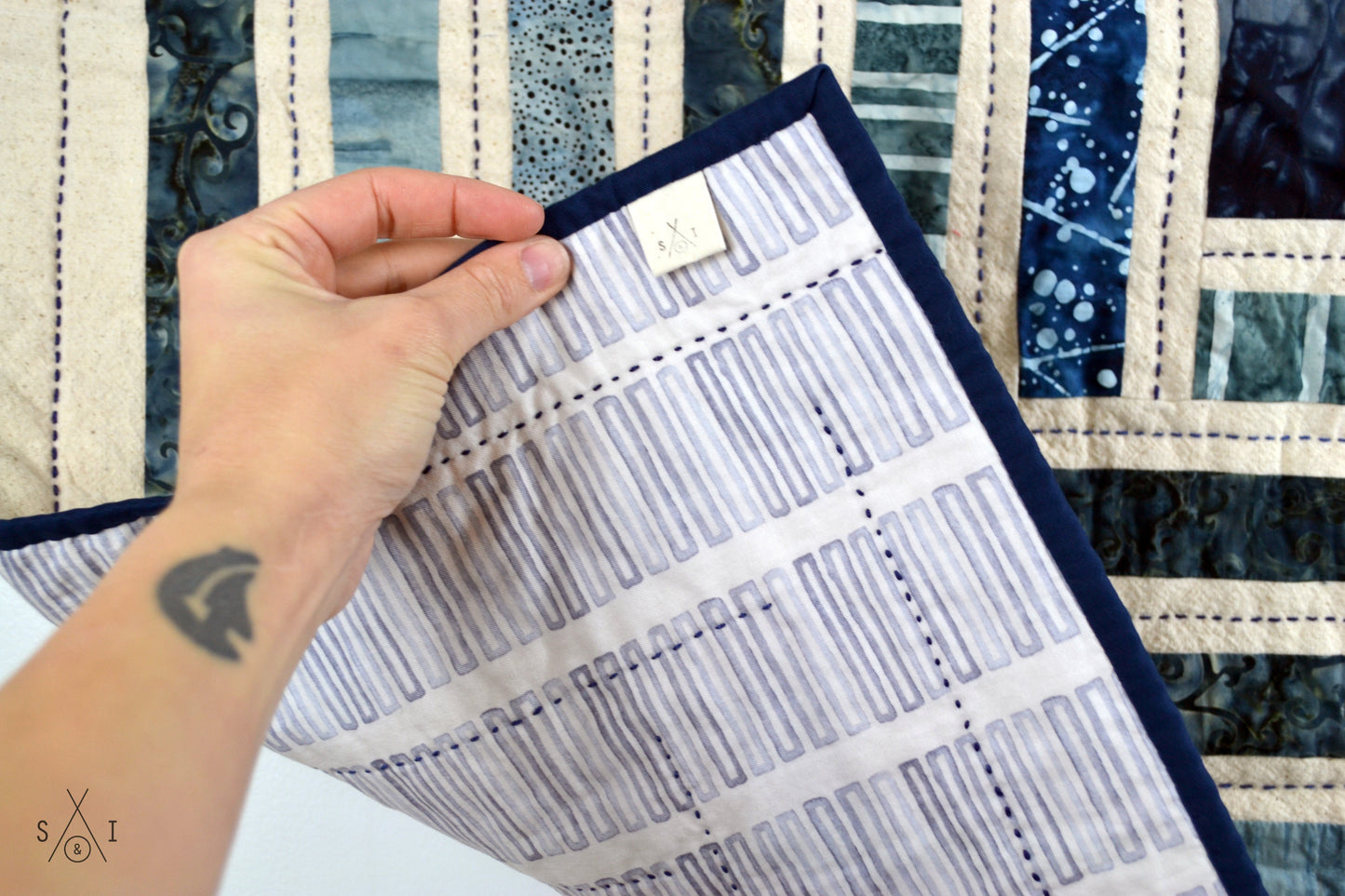 campfire baby quilt: blue batiks and osnaburg fabric